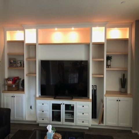 White wall unit with maple shelves
