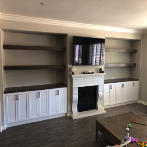 Base cabinets with white oak shelves and finish tops